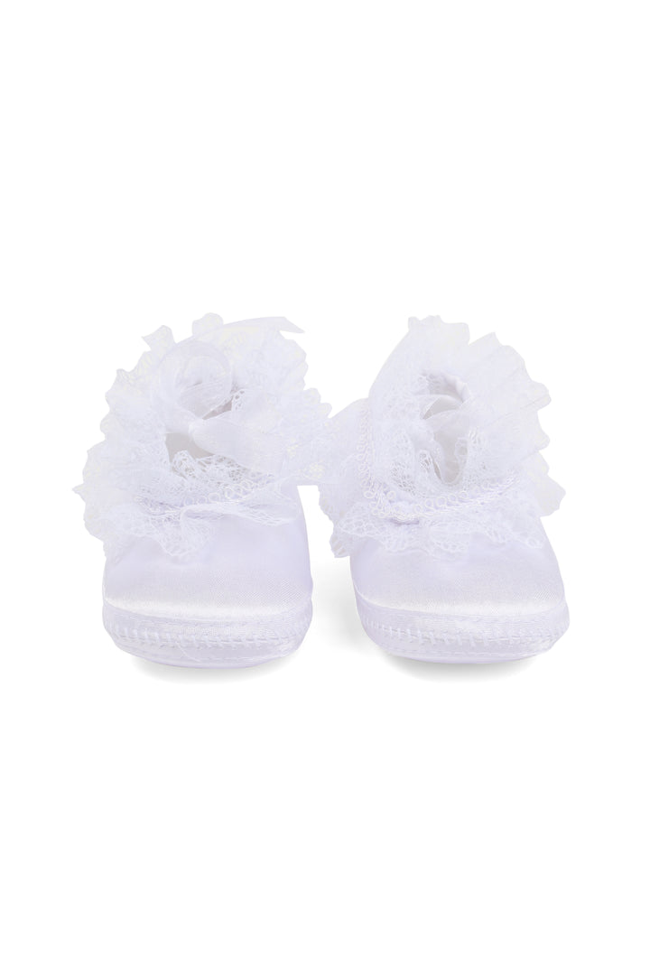 White baby shoes