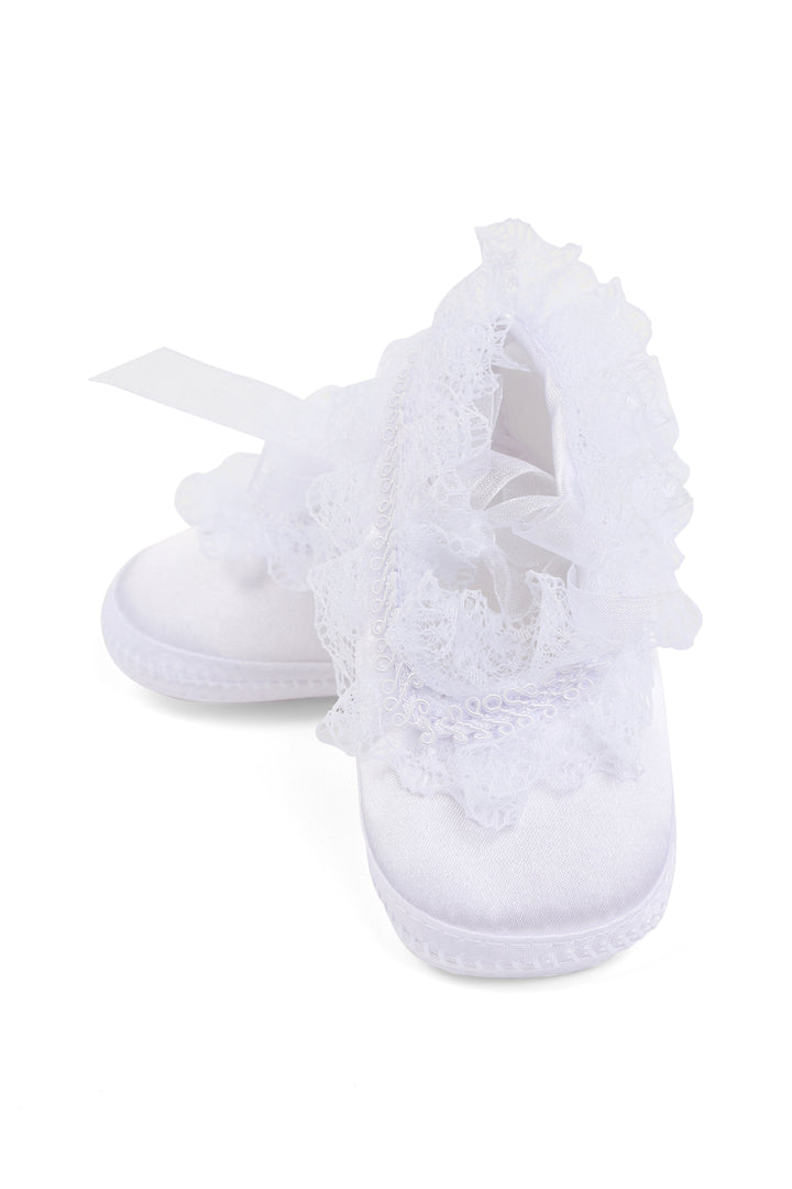 White baby shoes