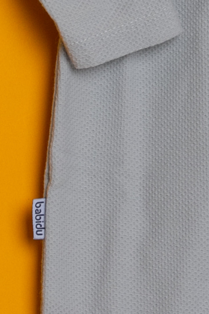 Grey and white baby overall