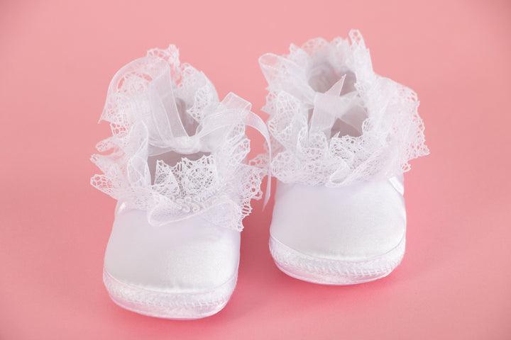 White baby shoes