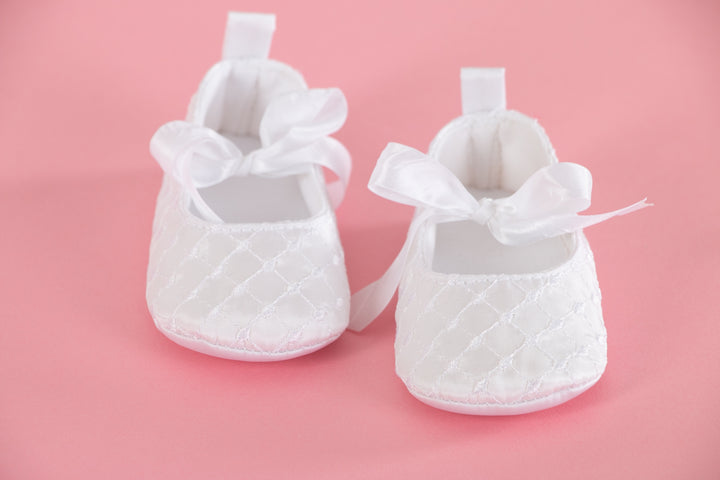 White baby shoes