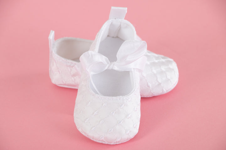 White baby shoes