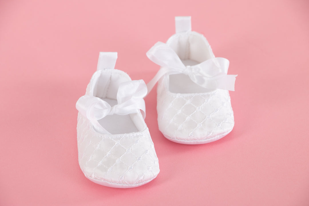 White baby shoes