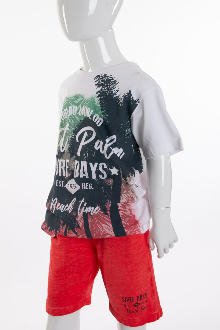 White sportswear with red shorts