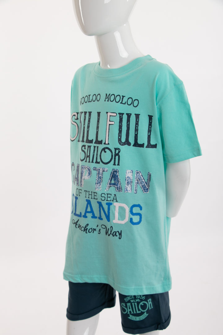 Turquoise sportswear and navy blue shorts