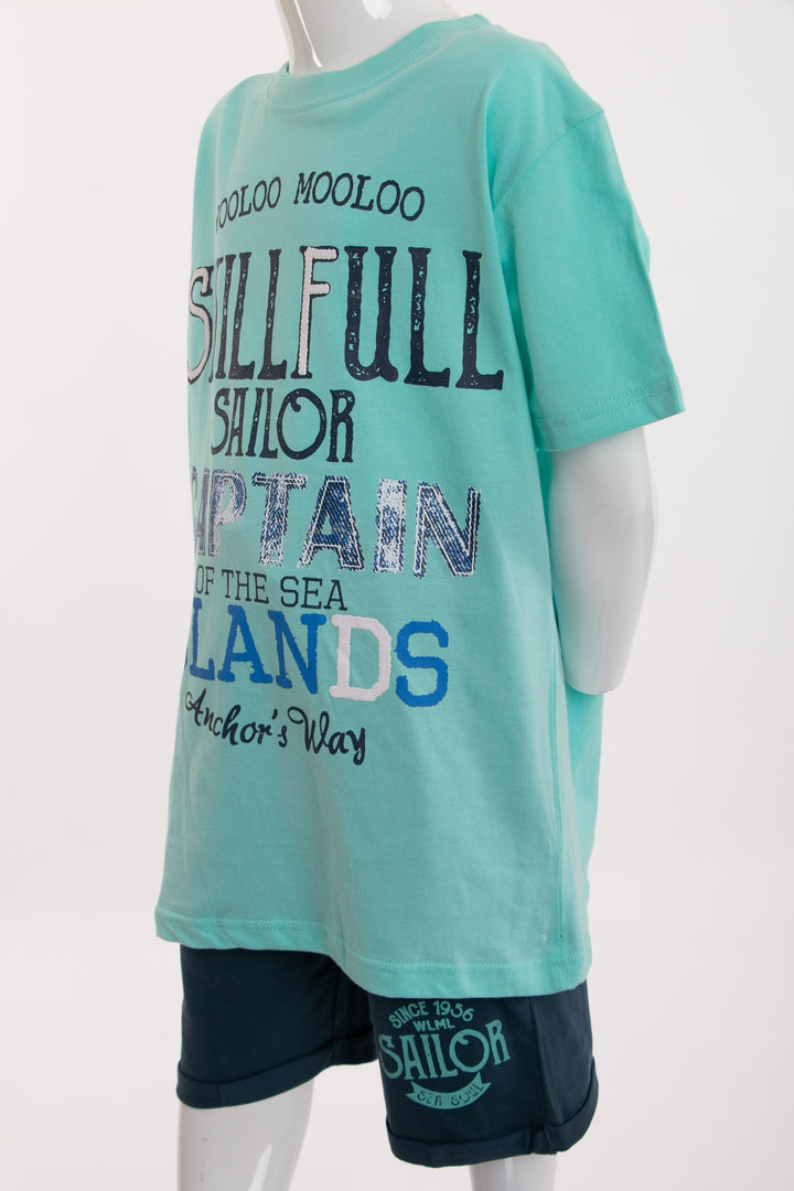 Turquoise sportswear and navy blue shorts